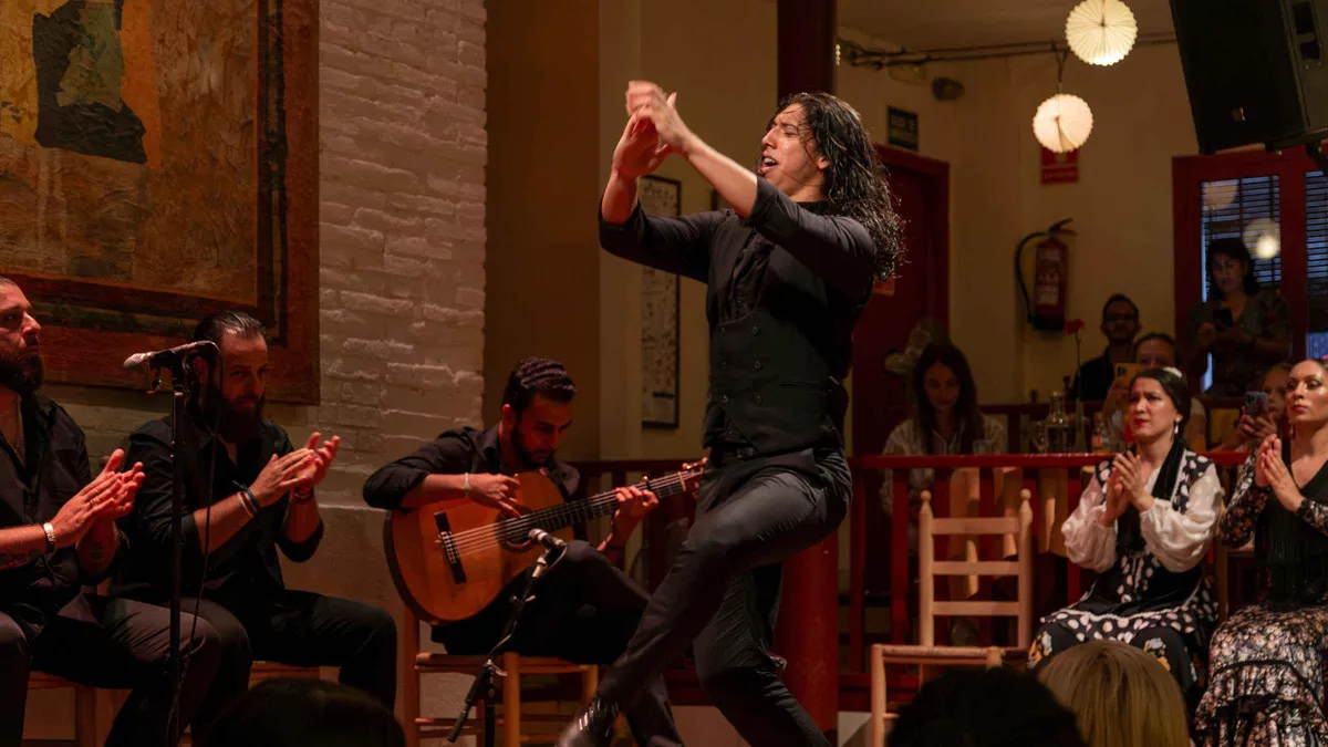 Dinner tables facing the stage at Tablao de Carmen before a flamenco show in Barcelona, Poble Espanyol, Spain